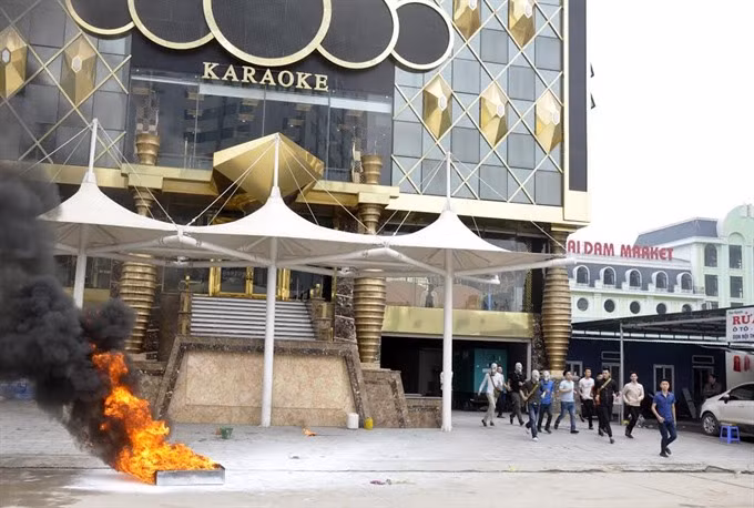 A fire fighting drill is conducted at Karaoke Phantom in Ha Long City, Quang Ninh Province. The province has temporarily stopped granting new licences for the entertainment service. 