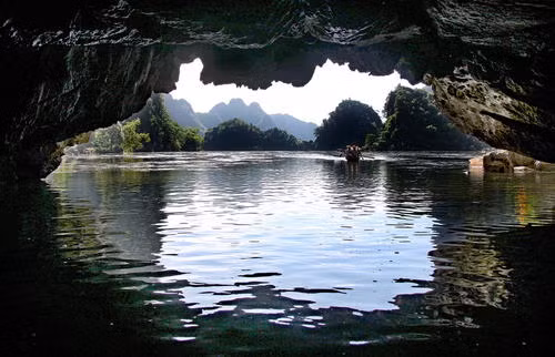 The view from inside a karst cave in Trang An