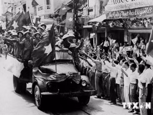 A photo shows Hanoians welcome Vietnamese soldiers returning to the capital city on October 10, 1954, after defeating French colonialists