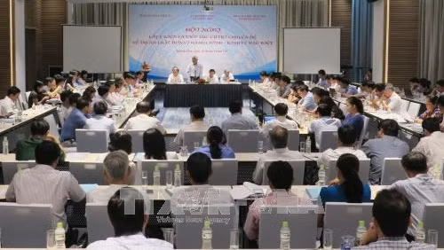 At the meeting (Photo: VNA)
