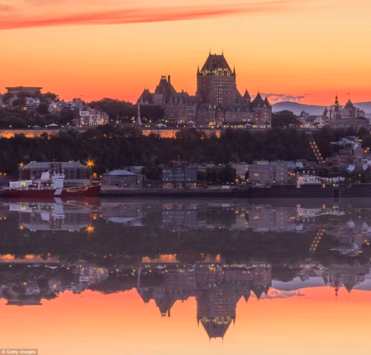 Québec City in Canada, is an unusual architectural sight to behold. Dating to 1608, it's an amalgamation of centuries-old structures and modern twinkling abodes, captured here in all its splendour