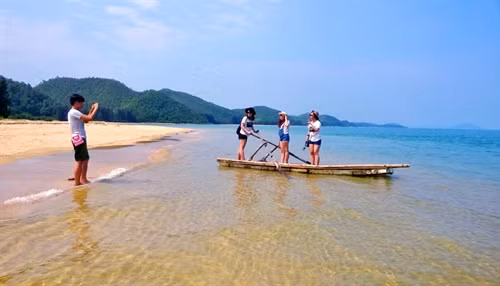 Relaxing: Sandy beaches, transparent water and gentle waves indulge tourists. Viet Nam News