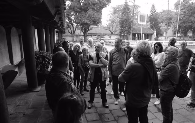 Foreign holiday-makers visit Van Mieu (the Temple of Literature) in Hanoi. (Photo: VNA)