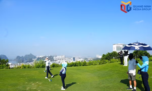 Tourists play golf at FLC Ha Long Golf Course in Ha Long ward.