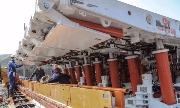 Installing and test-running the light mechanized longwall system underground before deployment at Duong Huy Coal Company.