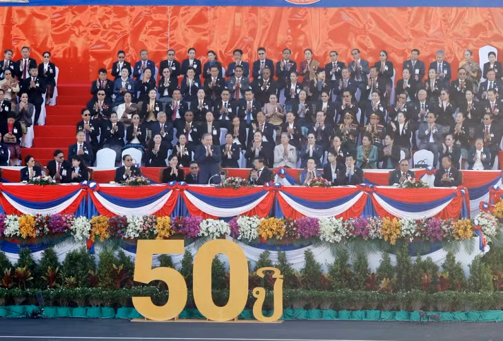 Party General Secretary Tô Lâm, his spouse and delegates attend the ceremony to celebrate the 50th anniversary of the National Day of the Lao People's Democratic Republic. — VNA/VNS Photo Thống Nhất