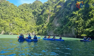 Exploring natural caves within Ha Long Bay