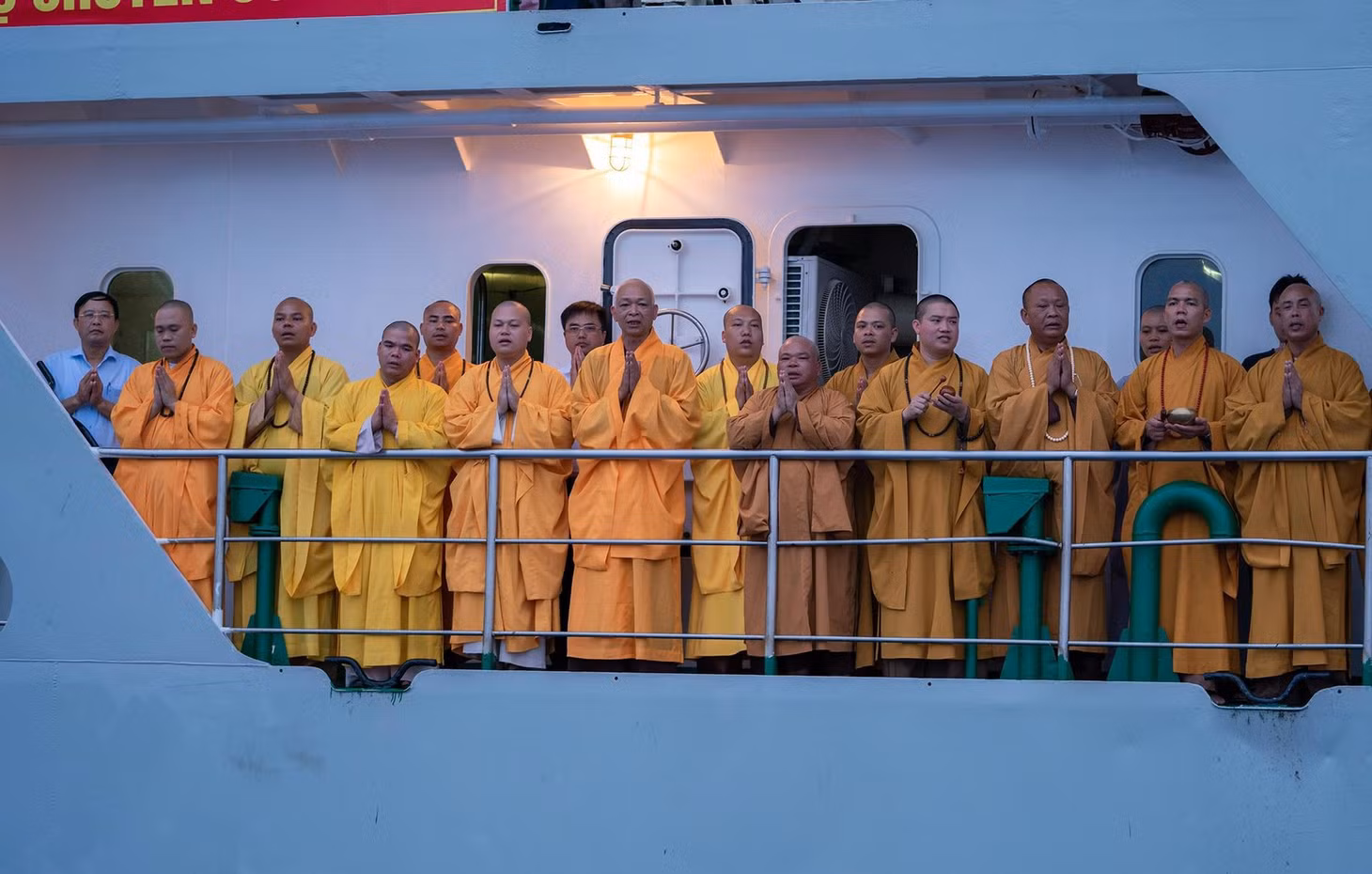 Buddhist monks chant during the memorial service.