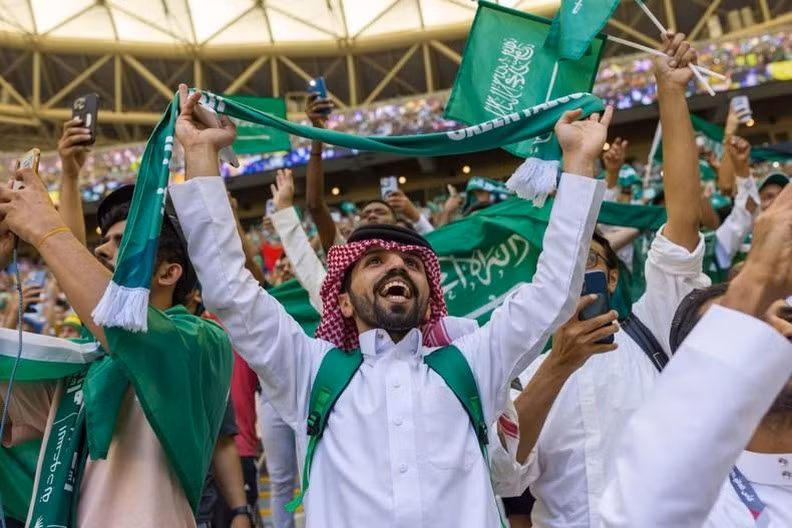 The fans from Saudi Arabia celebrate their team’s victory over Argentina. (Photo: REUTERS)