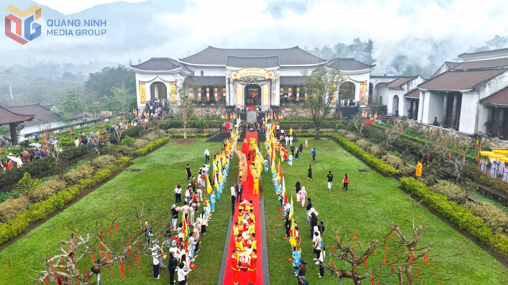 Delegates, residents, Buddhist followers and visitors take part in a ceremonial palanquin procession.