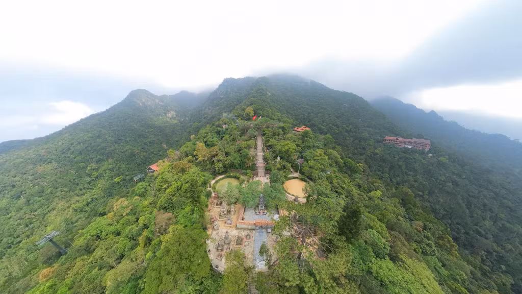 At every elevation, Yen Tu unfolds as a seamless harmony between emerald forests and floating white clouds.