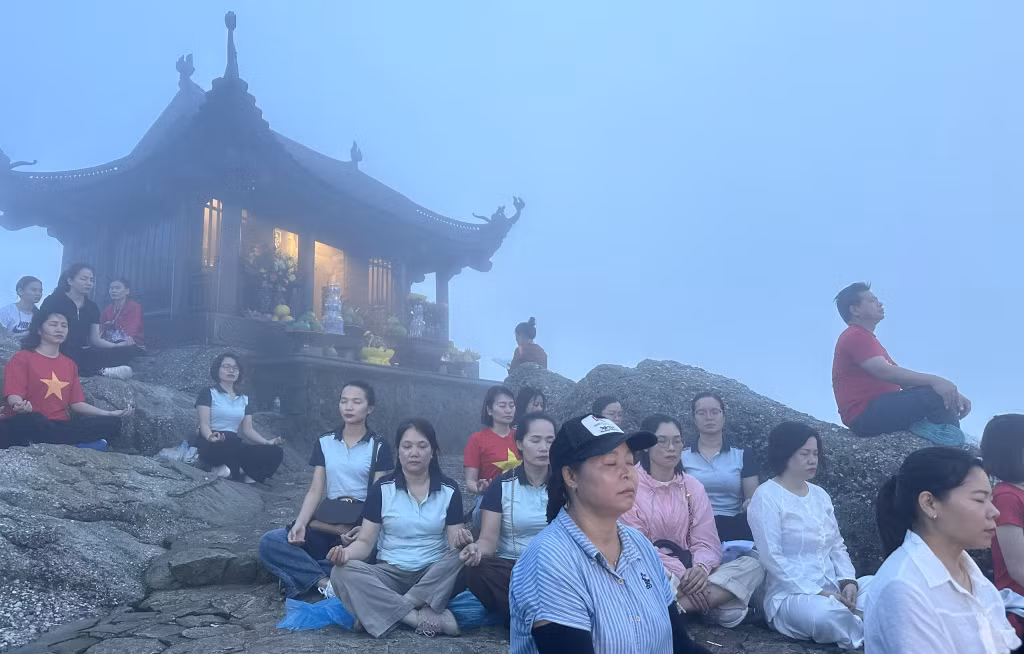 Visitors gather in meditation at Dong Pagoda, taking time to slow down, seek inner peace, and connect with the spiritual philosophies of Buddhism.