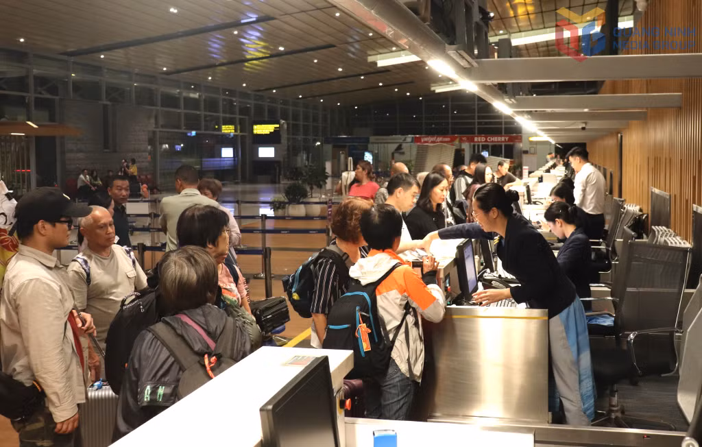Passengers complete check-in procedures at Van Don International Airport.