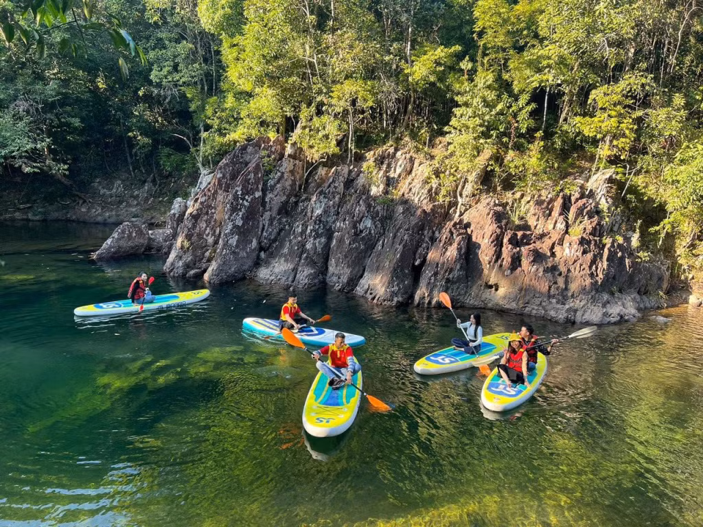Tourists enjoy their holiday at an ecotourism site, Ha Long city's Am Vap Farm.