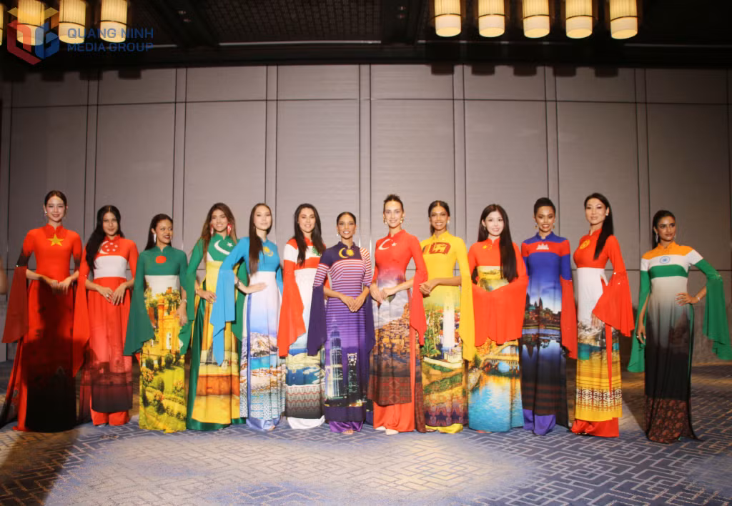The international contestants are all excited to wear áo dài featuring their national flags and images of their home countries.