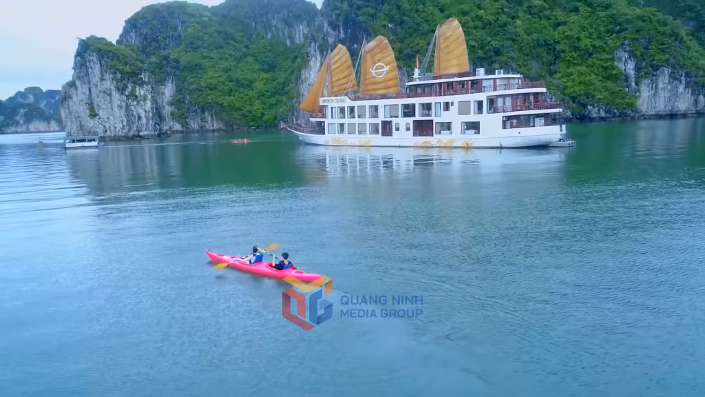 Bai Tu Long Bay offers a serene and pristine escape, where visitors can enjoy activities such as swimming, kayaking, and immersing themselves in nature.