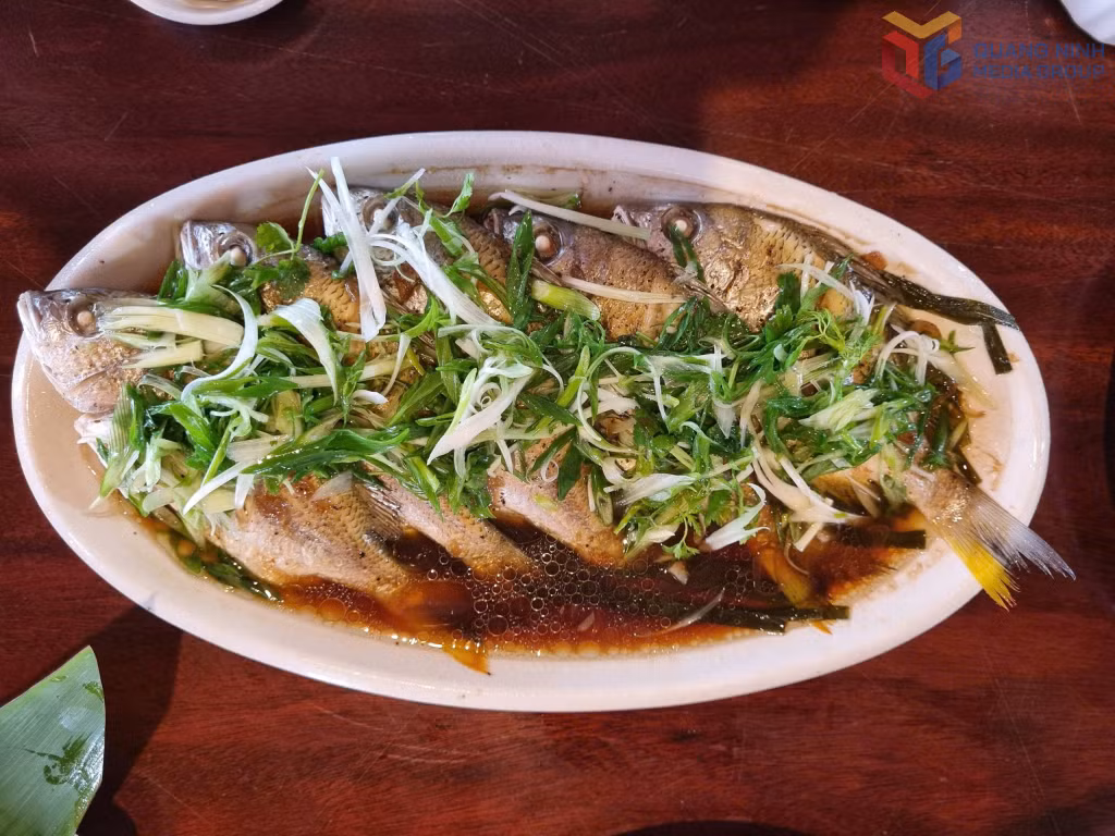 Steamed fish with black tea and soy sauce