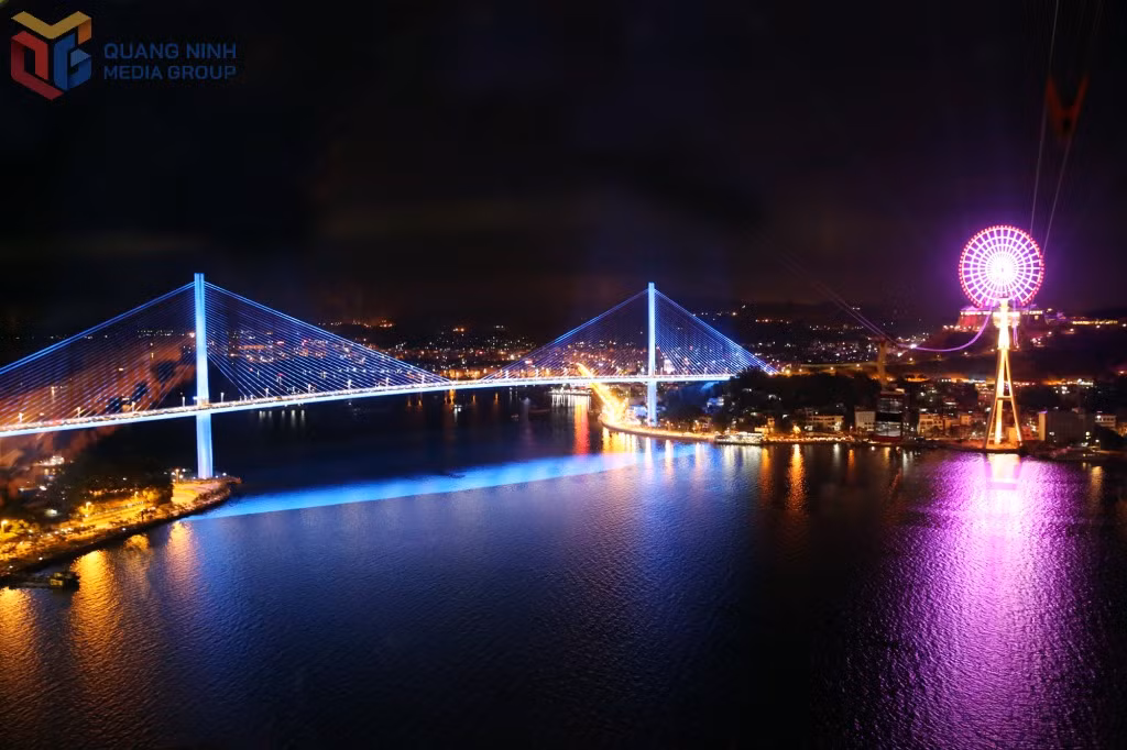 Bai Chay Bridge sparkles with lights at night.
