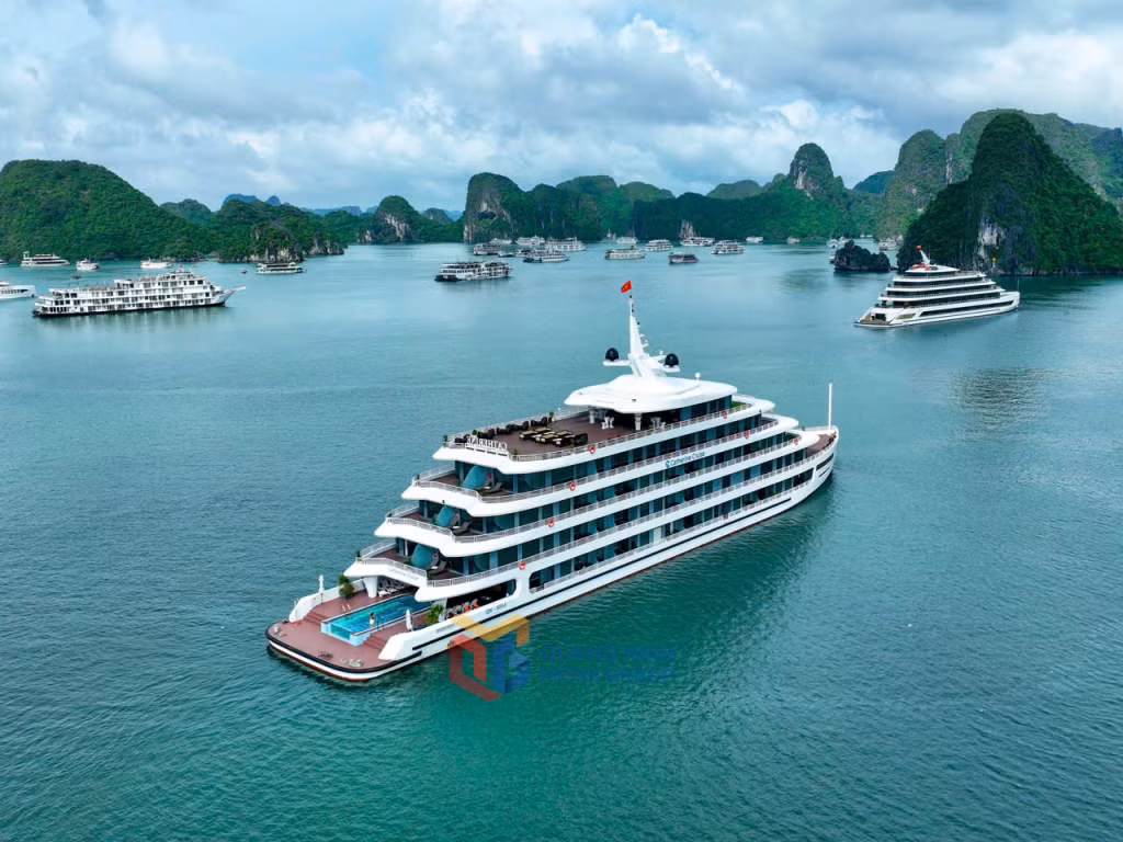 Cruise boats add a vibrant highlight, making the natural landscape of Ha Long Bay even more lively and captivating.