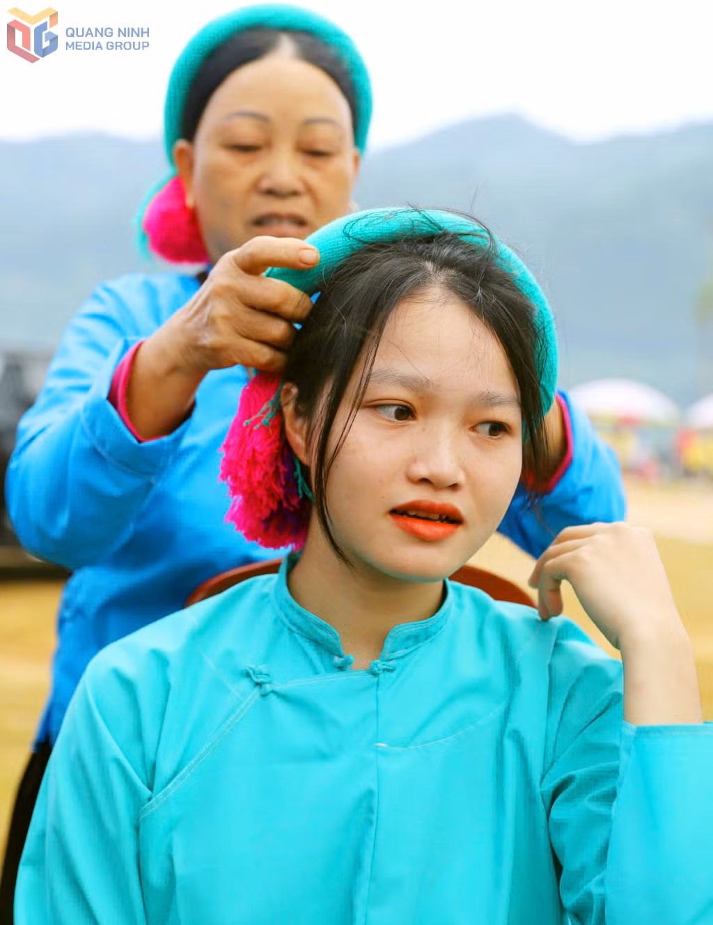 Female San Chi players from the Binh Lieu team have their traditional headscarves carefully tied.