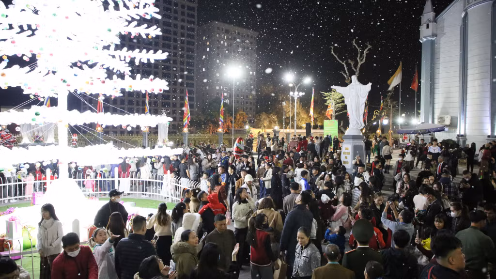 The bustling atmosphere at Hon Gai church in Ha Long city.