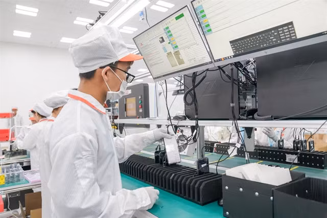 A technician at a production line of Vsmart phones. — VNA/VNS Photo