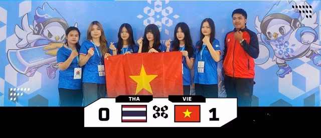 Vietnamese team pose for photo after first win at the Asian Esports Games 2024 on November 25 in Thailand. Photo of VIRESA