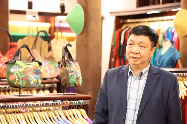 Nguyễn Văn Chí, director of the Hà Nội Rural Development Sub-Department, highlights the importance of preserving Vạn Phúc’s traditional heritage. — Photos courtesy of Hà Nội Rural Development Sub-Department