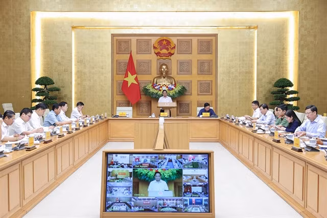 PM Phạm Minh Chính chairs an online meeting on recovery efforts after Storm No. 10 and floods. — Photo the Việt Nam Government Portal