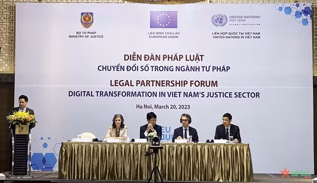 Delegates attend the forum on digital transformation in Việt Nam's justice sector held on Monday in Hà Nội. — Photo qdnd.vn