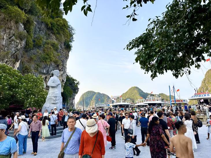 Visitors explore Titov Island on Ha Long Bay.