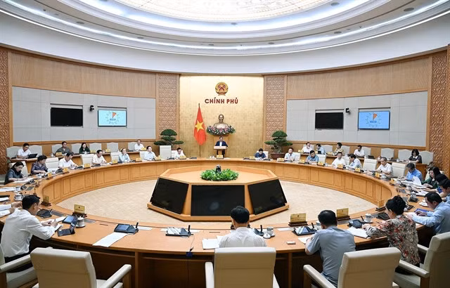 A Government meeting reviewing two months of implementing the two-tier administration model was held in Hà Nội on August 23. — VNA/VNS Photo