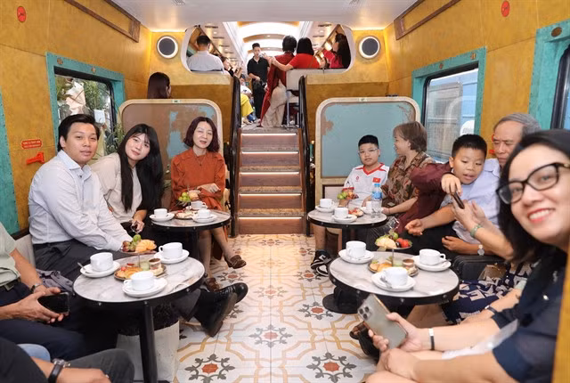 The Hà Nội Train features five double-decker seating carriages and two others designed for check-in experiences. — VNA/VNS Photo Thành Phương