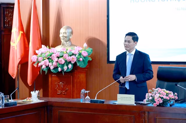 Associate Professor Dr Bùi Hữu Toàn, Party Committee Secretary and Chairman of the Banking Academy of Vietnam speaks at the conference. VNS Photo