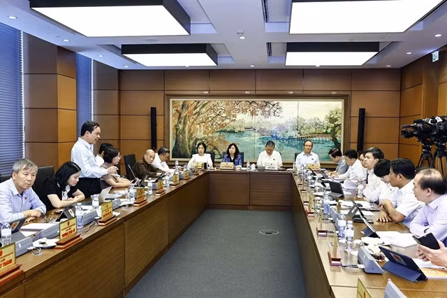 The National Assembly's group discussion on the proposed changes to Việt Nam's nationality law. — VNA/VNS Photo