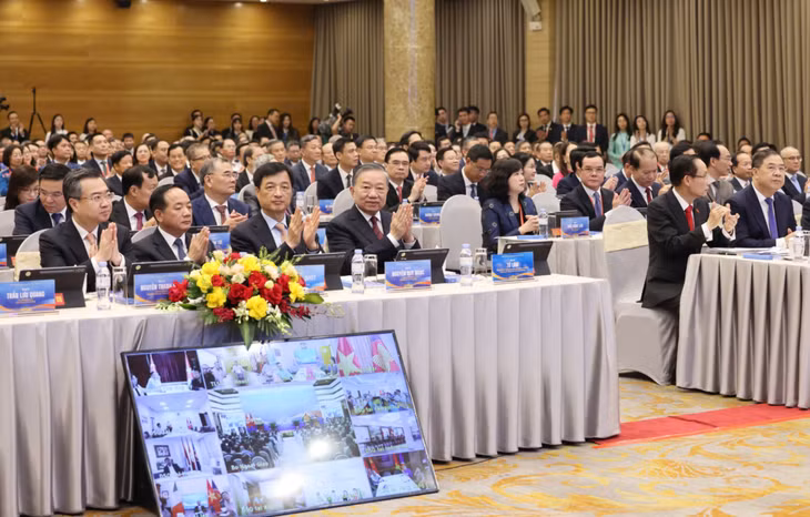 Delegates attend the conference