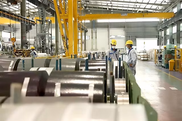 At JFE Shoji Steel Hai Phong Co Ltd, a Japanese-invested firm in the Việt Nam - Singapore Industrial Park. VNA/VNS Photo