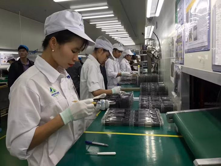 Enterprises invest in high technologies to boost export value. (Photo: VNA)