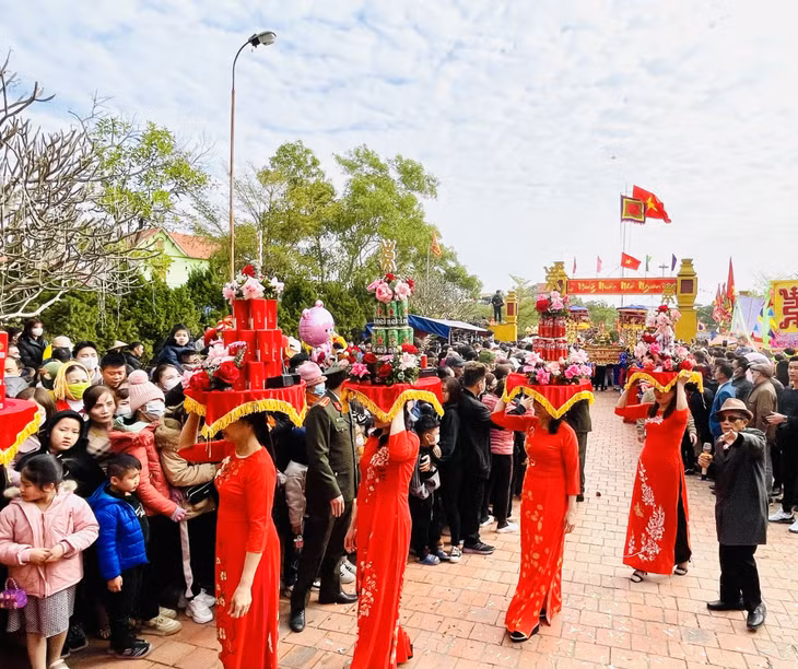 The participants in the ritual are mostly descendants of the family line. Children in the family wear the ao dai, the traditional Vietnamese tunic, at the temple. The ritual requires items like betel nuts, rice cakes, a pig’s head ...