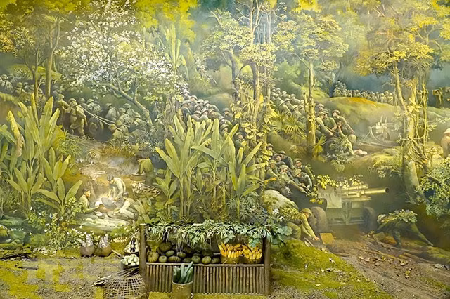 A part of the round mural painting depicting the historic Điện Biên Phủ military campaign in 1954 by artist Nguyễn Văn Mạc.