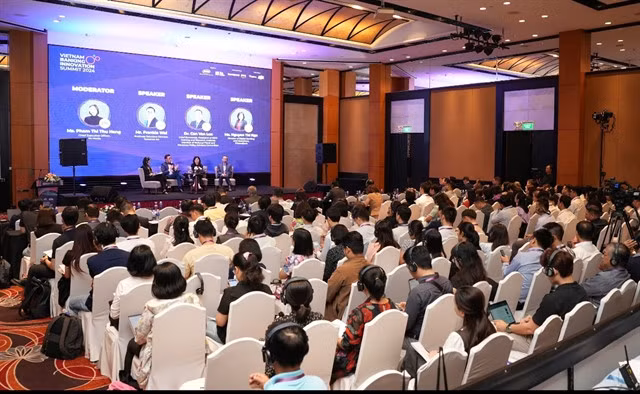 Speakers share their views about the development trends of the banking sector in Việt Nam at the Vietnam Banking Innovation Summit 2024 in HCM City late last week. – Photo Courtesy Vietnam Banking Innovation Summit 2024