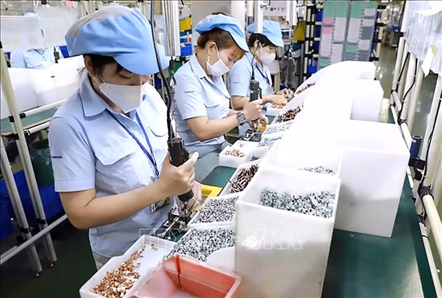 Workers at a foreign factory in HCM City. The new city is aiming to attract US$10.44 billion in foreign direct investment in 2025. — VNA/VNS Photo