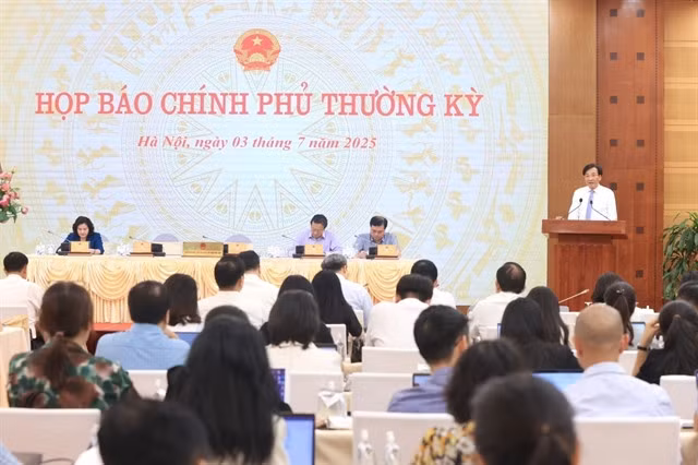 Government officials and members of the press at the regular press briefing on Thursday. — VNA/VNS Photo Tuấn Anh