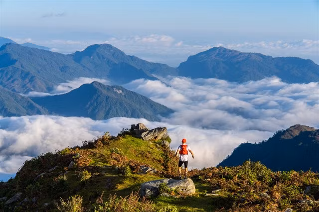A runner enjoy the beauty spot during the Việt Nam Mountain Marathon. — Photo courtesy of VMM