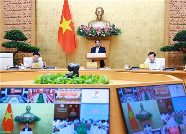Prime Minister Phạm Minh Chính chairs the Government’s regular meeting on Saturday. VNA/VNS Photo Dương Giang