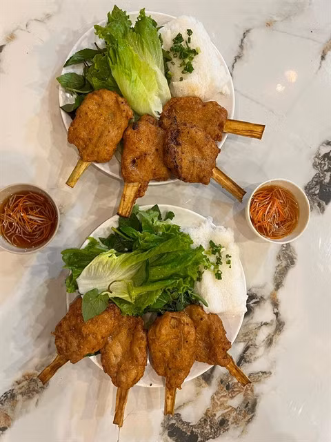 Sugarcane shrimp paste, locally known as chạo tôm, is among Việt Nam's must-try dishes. Photo khoahocphothong.vn