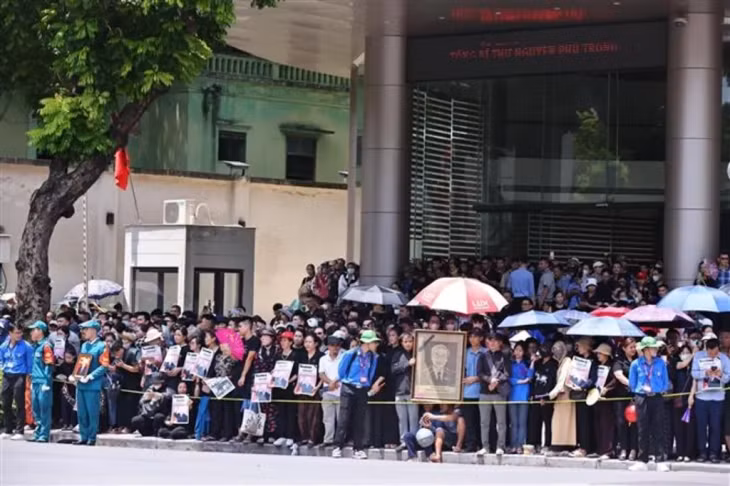 The streets are lined with citizens who have come to pay their respects.