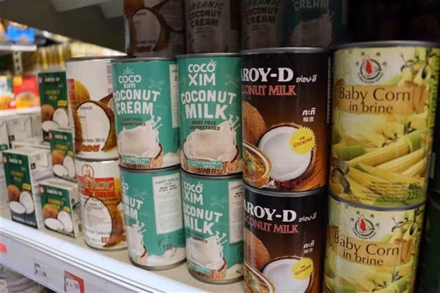 Agricultural and food products of Việt Nam on shelves in a store in Brussels. — VNA/VNS Photo Hương Giang