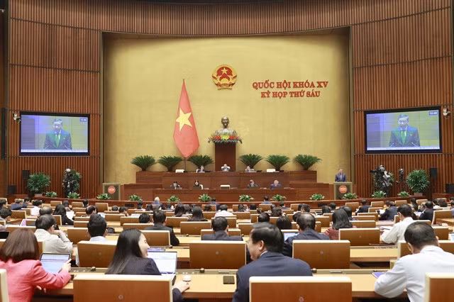 Tô Lâm, Minister of Public Security, delivers a report on crime prevention and control on Tuesday at the National Assembly meeting. — VNA/VNS Photo