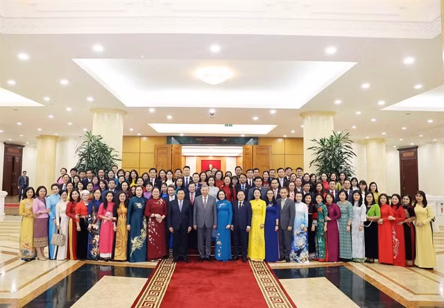 Party General Secretary Tô Lâm and members of the 15th-tenure Young National Assembly Deputies Group at the celebration of its 10th anniversary on June 24 in Hà Nội. - VNA/VNS Photo